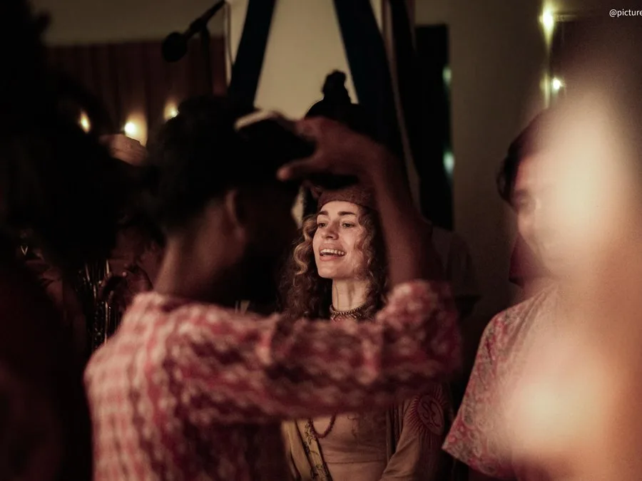 Laughing together at the Kirtan Mela